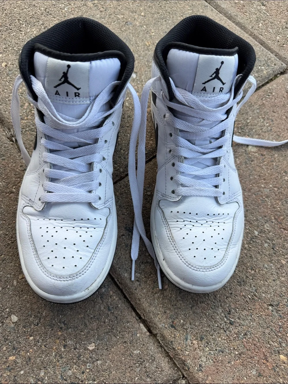 Jordan White and Black High-Top Sneakers